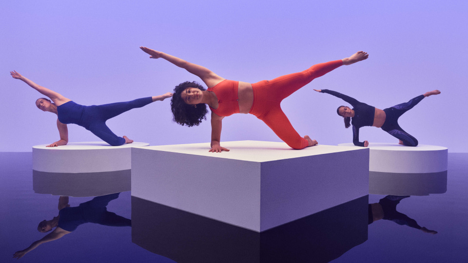 group of ladies performing pilates pose