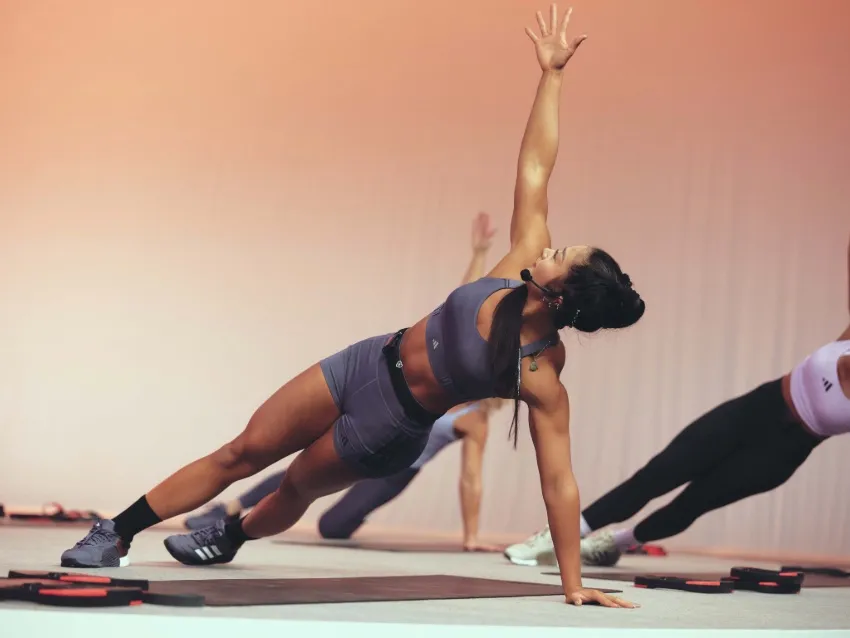 Les Mills Instructor teaching a group training LES MILLS CORE class